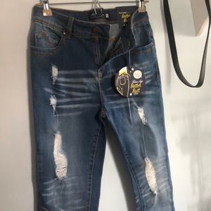 Distressed jeans from Fashion Nova.com